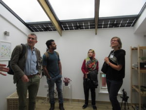 Dr Simon Taylor and LoLo Students in the ZedFactory House